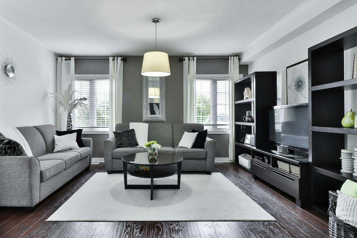 Comfortable living room with a sofa, coffee table and natural light